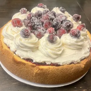 Cranberry Bliss Cheesecake w/  white chocolate mousse, cranberry jam and candied cranberries