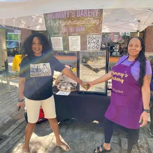 Owner and Customer at a Festival in Pittsburgh