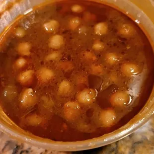 Oil dipped punjabi chole with zero taste and just water