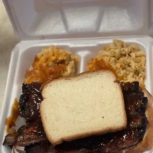 a meal in a styrofoam container