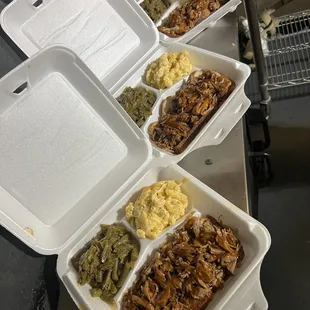 a variety of food in a styrofoam container