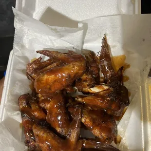 chicken wings in a styrofoam container