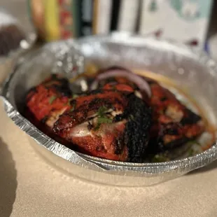 Tandoori Chicken, cool in the middle and one piece burnt. Meh..