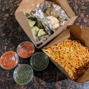 a box of noodles and sauces
