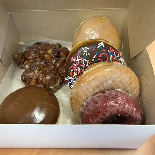 So we tried glazed, glazed and iced, red velvet cake, apple fritter, raspberry filled and Bavarian filled donuts.
