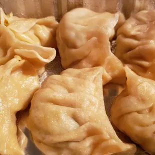 Veggie momo, vegan by default (but avoid the green chutney which has yogurt in it) ($10). Tasty and good.