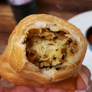 Interior of vegetable samosa ($7), vegan by default. Dry and bland filling. Not good.
