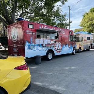 food trucks parked on the side of the road