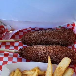 Corn dogs with fries