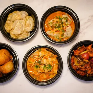 four bowls of food