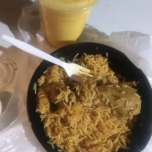 Chicken biryanis with mango drink