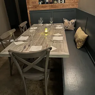 a dining table and bench