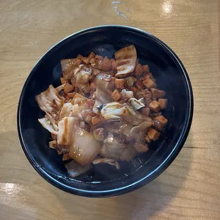 Spicy Teriyaki Chicken bowl with onion and cabbage