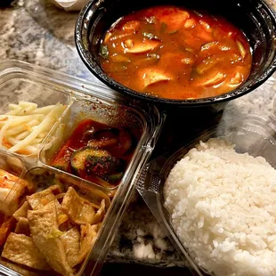 Tofu stew and banchan sides
