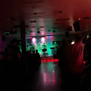 a band performing on stage