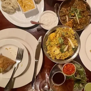 Steamed vegetable momo, laccha paratha, tikka saag with lentils, special biryani, vegetable samosa, papadam... all delicious!