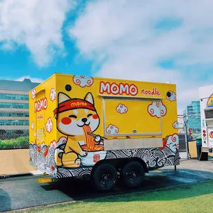 a yellow food truck