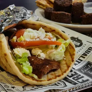 a pita with meat and vegetables