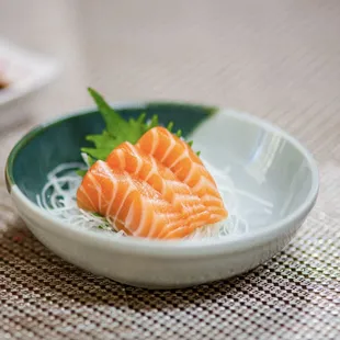 a close up of a plate of sushi