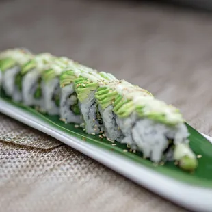 a close up of a plate of sushi