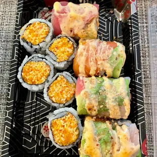 Spicy kani roll and Beauty &amp; the Beast roll (to go)