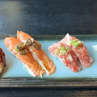 A La Carte - Unagi (bbq eel), New Zealand King Salmon with truffle slice in oil, Toro Neki, Aji (spanish mackerel)