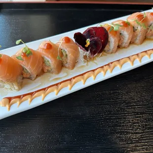 Salmon Royale (spicy salmon and cucumber, covered with New Zealand King Salmon)