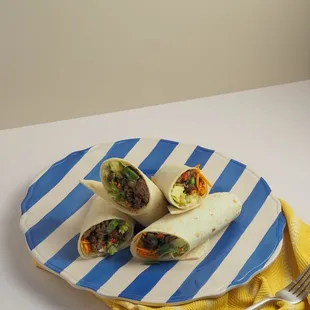 two burritos on a plate