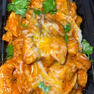 Cheesy Curry Chicken over Dumplings |IG @kurlykonnoisseur