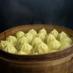 a bowl of steamed dumplings