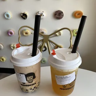 two cups of iced coffee on a table