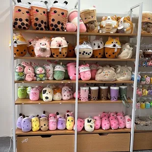 a variety of stuffed animals on display