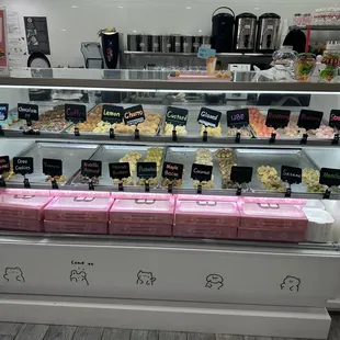 a display case with a variety of treats