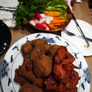 The mound of Fried Chicken with veggies