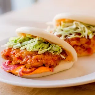 Seared Shrimp Buns with spicy mayo and pickled red onion.