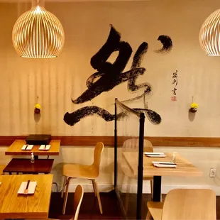 a dining area with tables and chairs