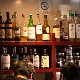 a man and a woman at a bar