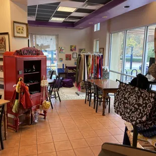 Inside merchandise from jewelry to purses to skirts. Kids play area in the corner too.