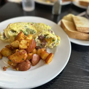 Steve&apos;s omelette and homestyle potatoes