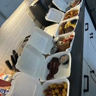Pancakes &amp; French toast w/ fruit, syrup whipped cream &amp; powdered sugar, country potatoes, eggs, bacon &amp; sausage patties!