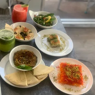 Fresh lemon mint, watermelon juice, kunafa, hummus, baklava and tabouleh.