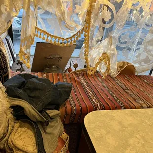 a view of a bed and a window