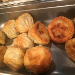 a tray of chinese dumplings