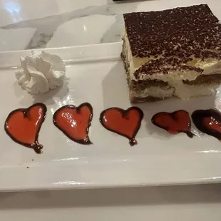 a piece of cake with chocolate and cream