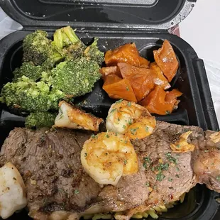 Steak and Shrimp and Broccoli and yams. The Broccoli seasoned very good.