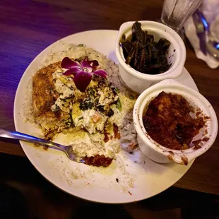 Stuffed salmon, creamy rice, sweet yams, and greens.