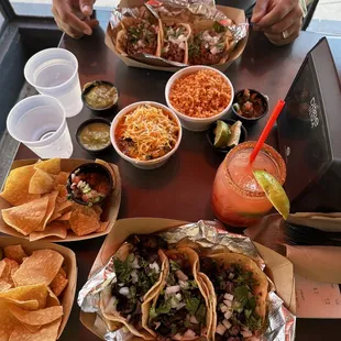 a table full of mexican food