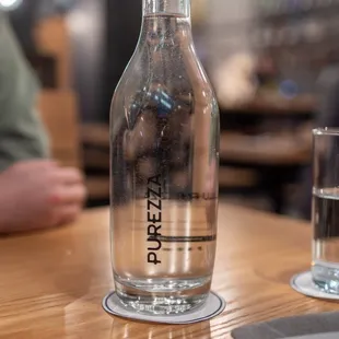Bottle of water at the table ($0) =)