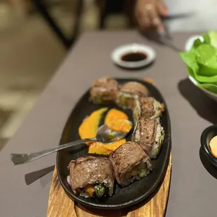 Medium seared surf and turf sushi roll