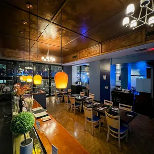 a restaurant with a long wooden table